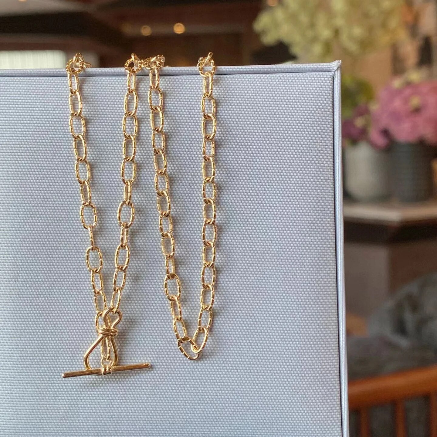 Collier chaîne torsadée à motif dappé