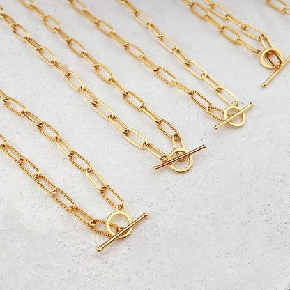 Collier barre en T à chaîne étirée moletée