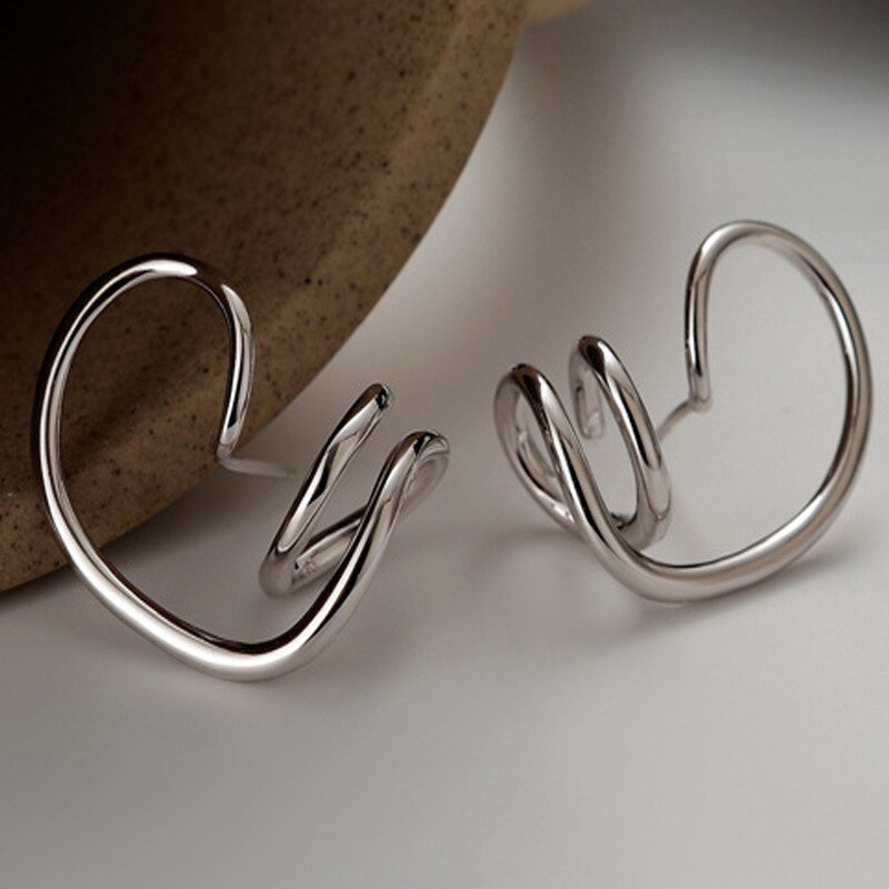 Clous d'oreilles à motif de fil abstrait E1029