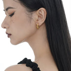 Boucles d'oreilles créoles en filigrane tressé E1032