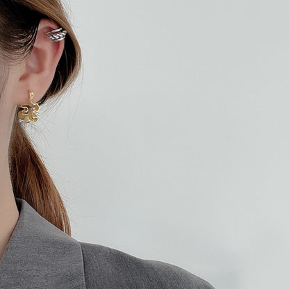 Boucles d'oreilles créoles à plis irréguliers E1042