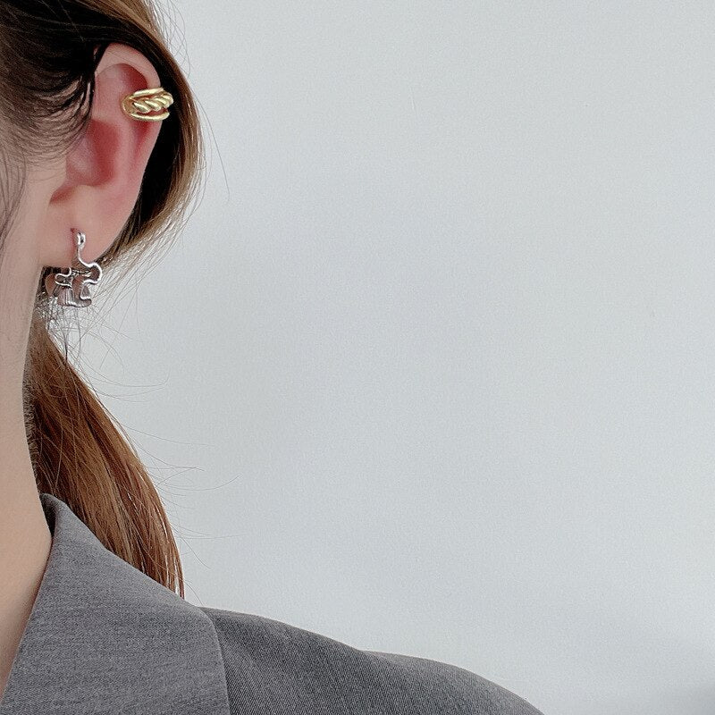 Boucles d'oreilles créoles à plis irréguliers E1042