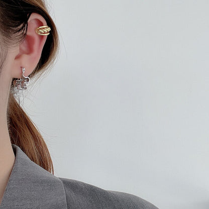 Boucles d'oreilles créoles à plis irréguliers E1042