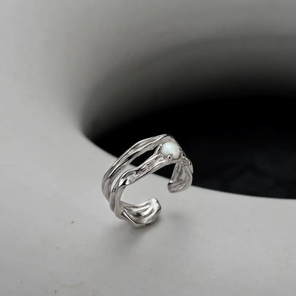 Manchette d'oreille irrégulière opale E1134, 1 pièce