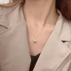 Pendentif coquille de trompette de conque N1012