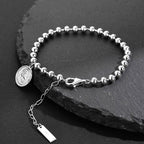 Bracelet chaîne à billes Elizabeth Coin B1015