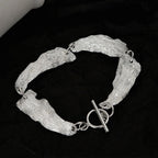 Bracelet à maillons motif feuilles froissées B1039