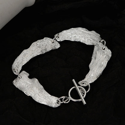 Bracelet à maillons motif feuilles froissées B1039