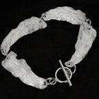 Bracelet à maillons motif feuilles froissées B1039