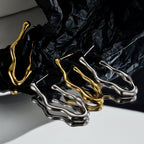 Clous d'oreilles en filigrane de forme libre E1233