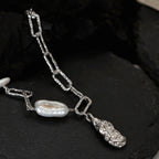 Bracelet à chaîne allongée en perles baroques B1038