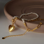 Pendentif coeur en perles baroques graines N1023