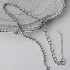 Collier chaîne torsadée à boules épaisses N1047