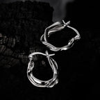 Huggies d’oreille torsadés E1147