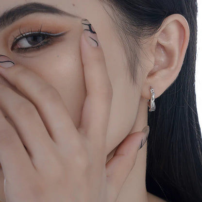 Huggies d’oreille torsadés E1147
