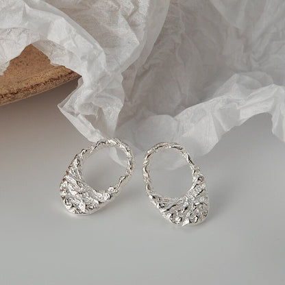 Boucles d'oreilles créoles martelées E1048