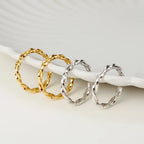 Anneau irrégulier à bande torsadée R1156