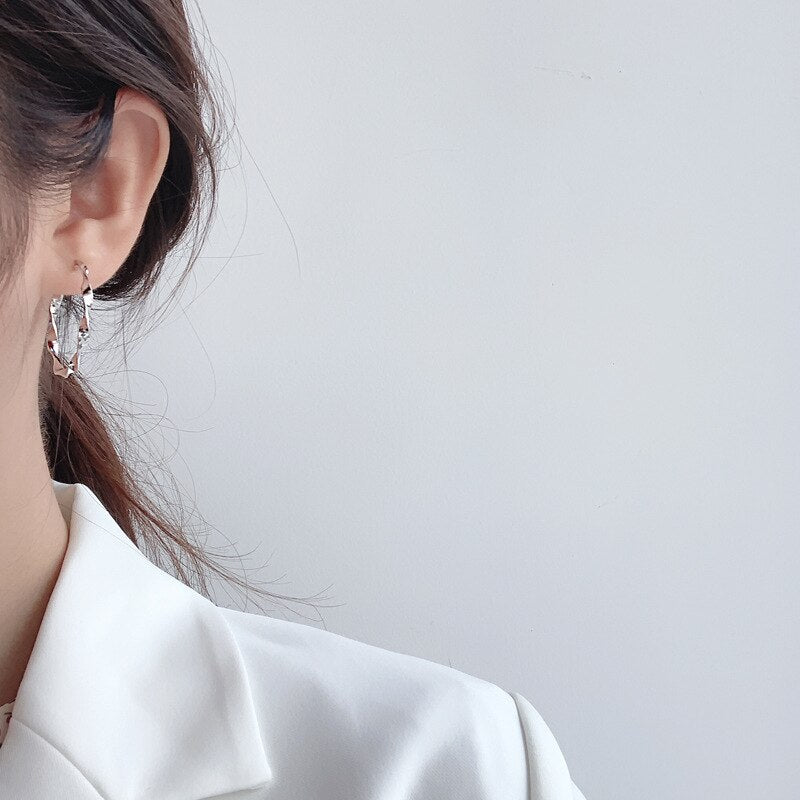 Boucles d'oreilles créoles en fil torsadé E1043