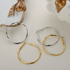 Boucles d'oreilles créoles en fil torsadé E1043