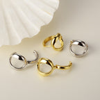 Boucles d'oreilles torsadées en forme de O E1000