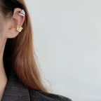 Manchette d'oreille liquide large E1058 1 pièce