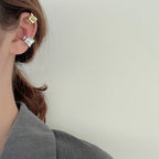 Manchette d'oreille large ondulée E1064 1 pièce