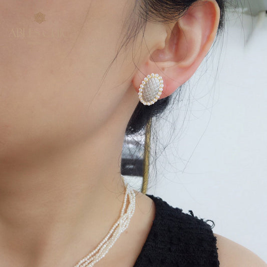 Boucles d'oreilles halo ovale soyeux 5832