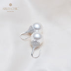 Boucle d'oreille en perles de coquille florale 5785