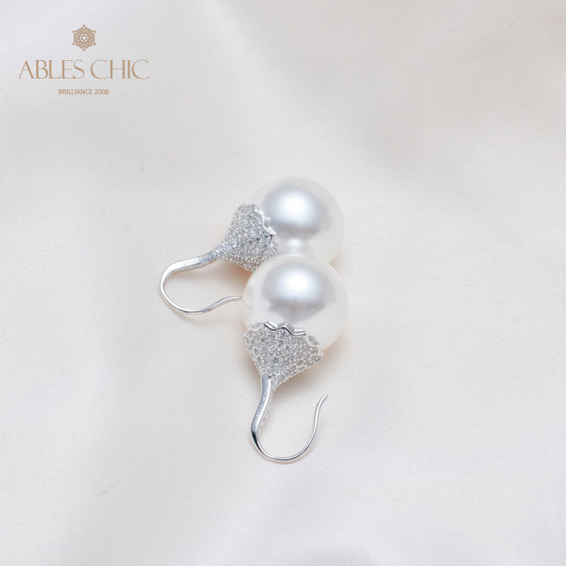 Boucle d'oreille en perles de coquille florale 5785