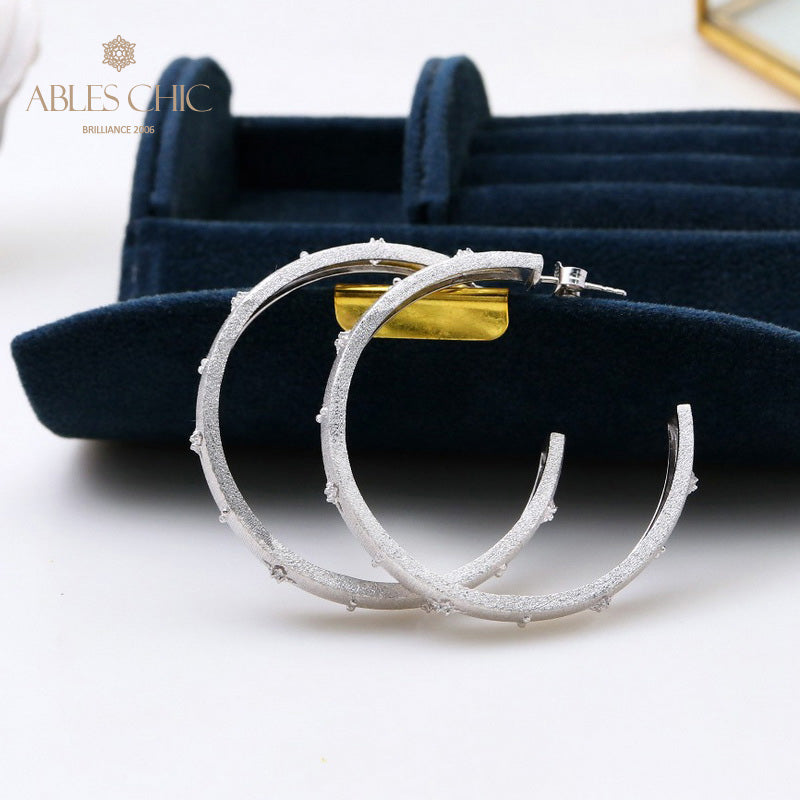 Boucle d'oreille créole trèfles en soie 5530