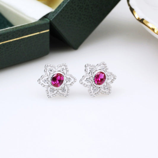 Boucles d'oreilles avec pierres précieuses et fleurs étoilées 5385