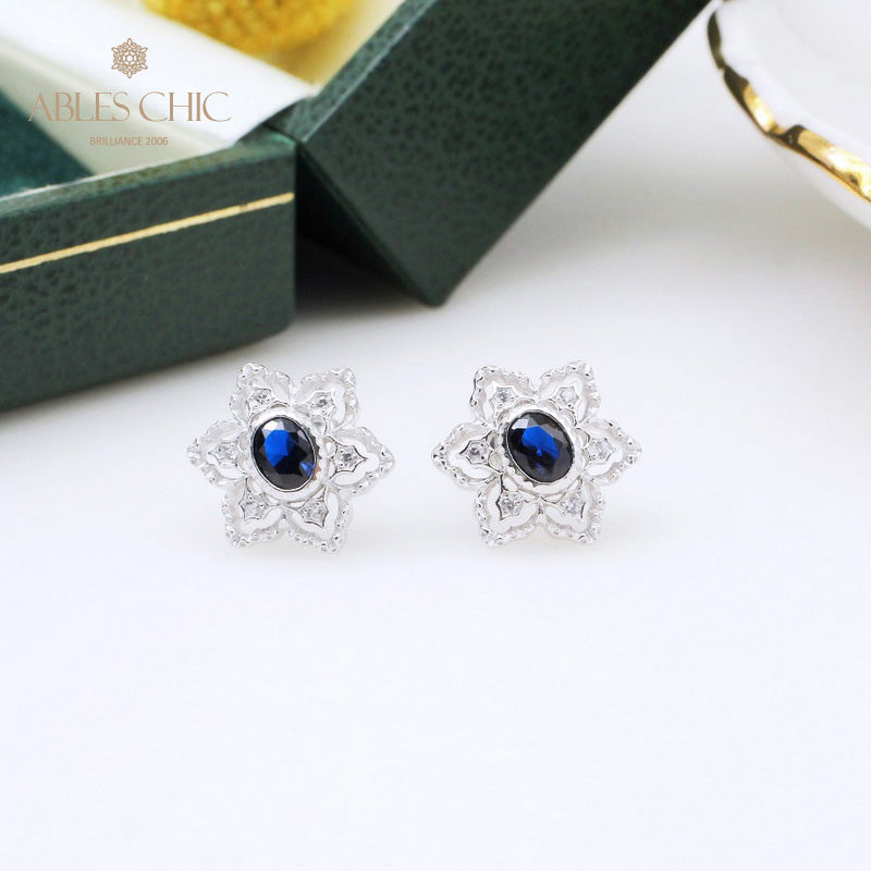 Boucles d'oreilles avec pierres précieuses et fleurs étoilées 5385