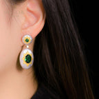 Boucles d'oreilles pendantes ovales étoilées et soyeuses 5468