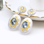 Boucles d'oreilles pendantes ovales étoilées et soyeuses 5468