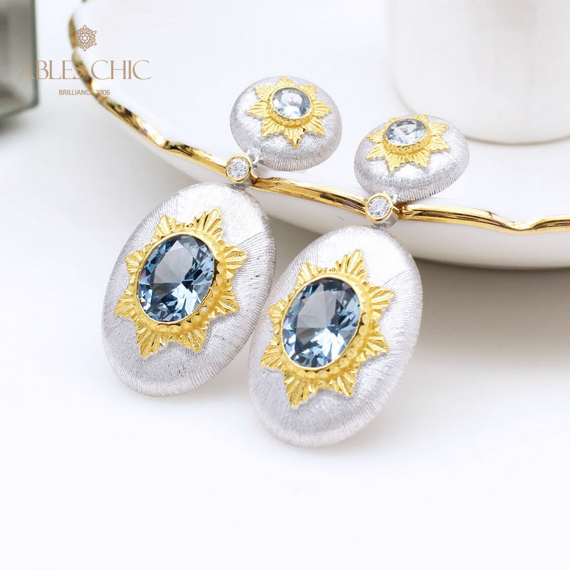 Boucles d'oreilles pendantes ovales étoilées et soyeuses 5468