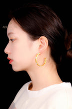 Boucles d'oreilles créoles étoiles en soie 5482