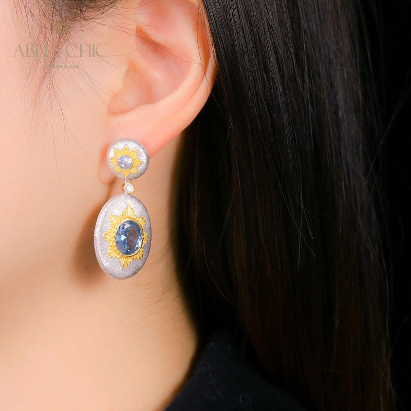 Boucles d'oreilles pendantes ovales étoilées et soyeuses 5468