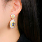 Boucles d'oreilles pendantes ovales étoilées et soyeuses 5468