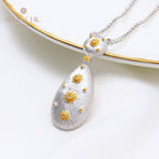 Collier floral en forme de larme soyeuse 5024