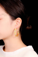Boucles d'oreilles créoles étoiles en soie 5482