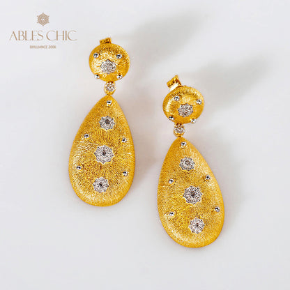 Boucles d'oreilles étoilées en forme de larme soyeuse 5050