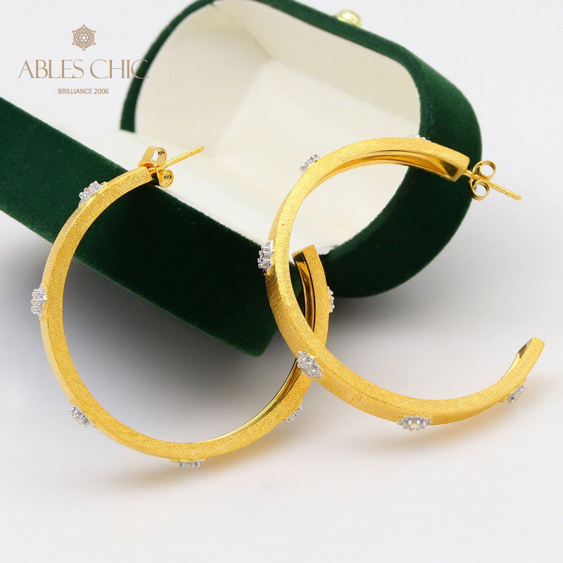 Boucles d'oreilles créoles étoiles en soie 5482