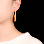 Boucles d'oreilles créoles étoiles en soie 5482
