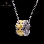 Collier nid d'abeille feuille filigrane 5807