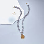 Collier médaillon réversible en perles d'Akoya et pièce de monnaie byzantine