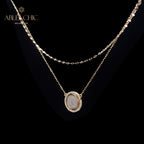 Collier médaillon réversible grec