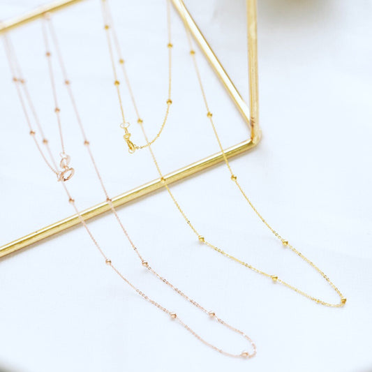 Collier chaîne chapelet satellite perles Saturne