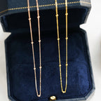 Collier chaîne chapelet satellite perles Saturne